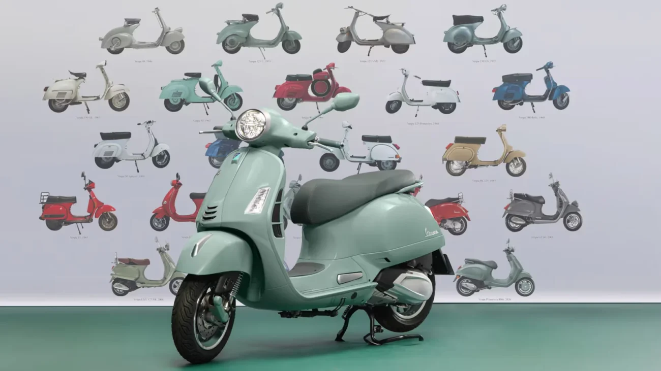 Nyolc évtized Vespa-modelljei egy fal előtt