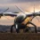 Az Archer Midnight eVTOL a kifutón napnyugtakor, tizenkét légcsavarral
