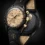 A Swatch x Omega Mission to the Moon 1969 óra arany számlappal és holdtextúrás szíjjal